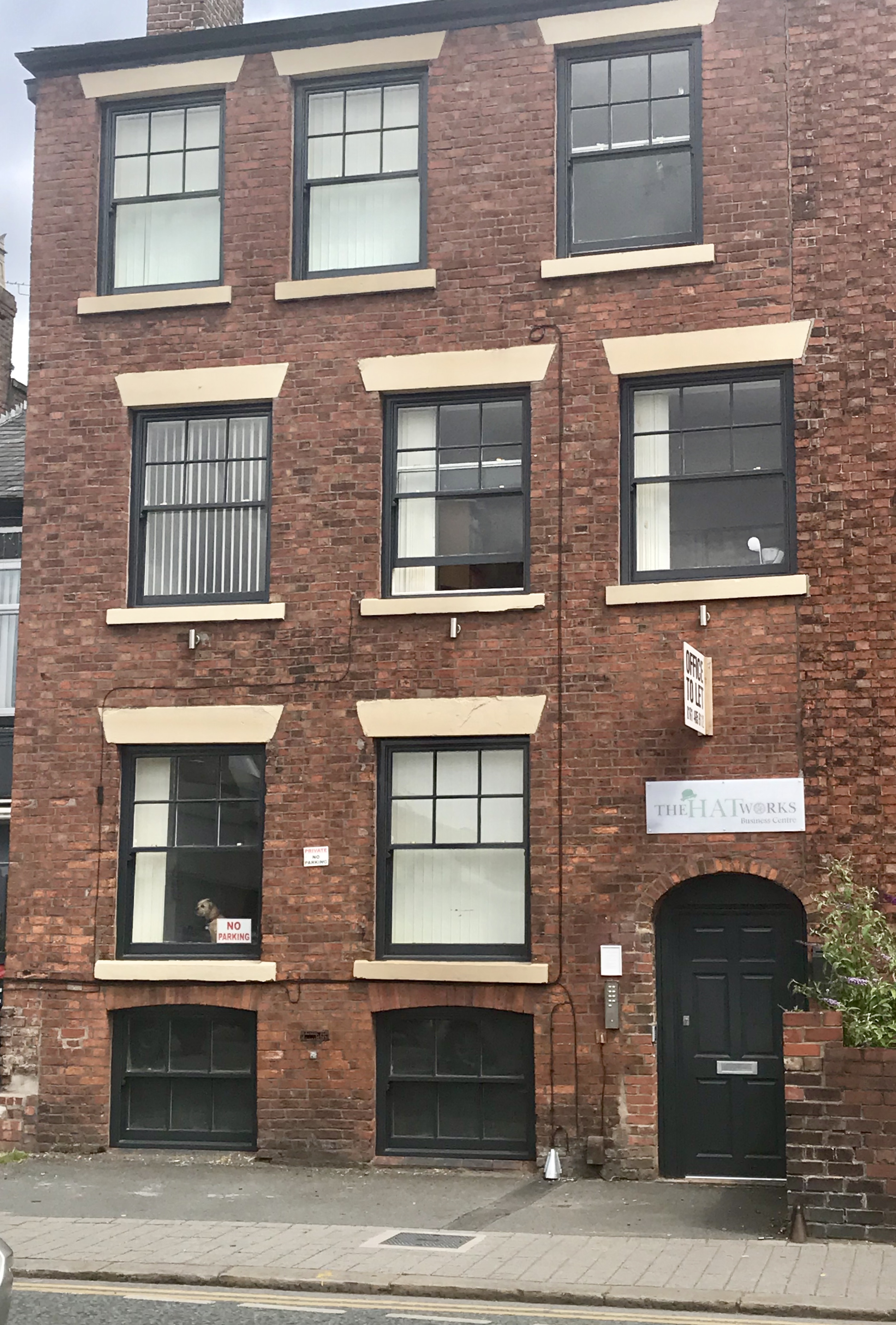 The Hat Works Business Centre façade on Stockport Road, Denton
